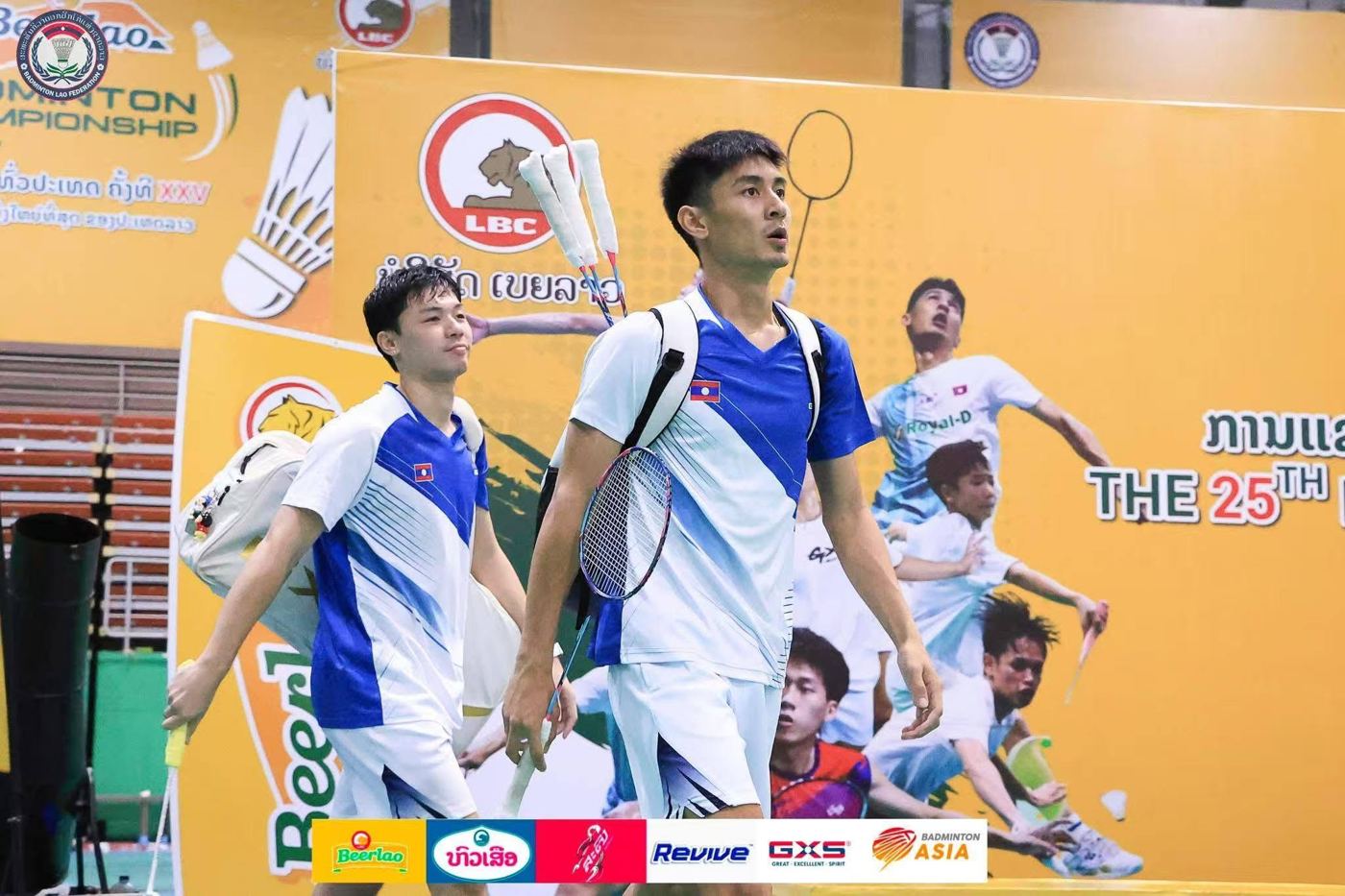 Labdork players walking out at the 25th Beerlao Badminton Championship
